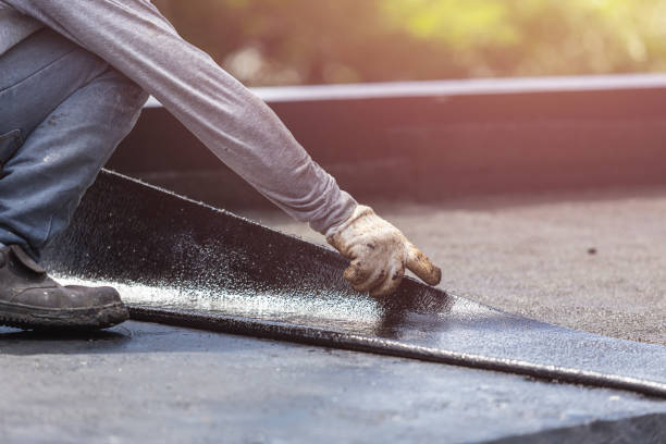 Professional Basement Waterproofing technician working in Gambrills, MD
